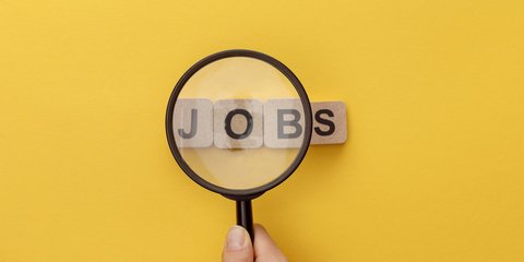 Lupe über Schrift "Jobs"